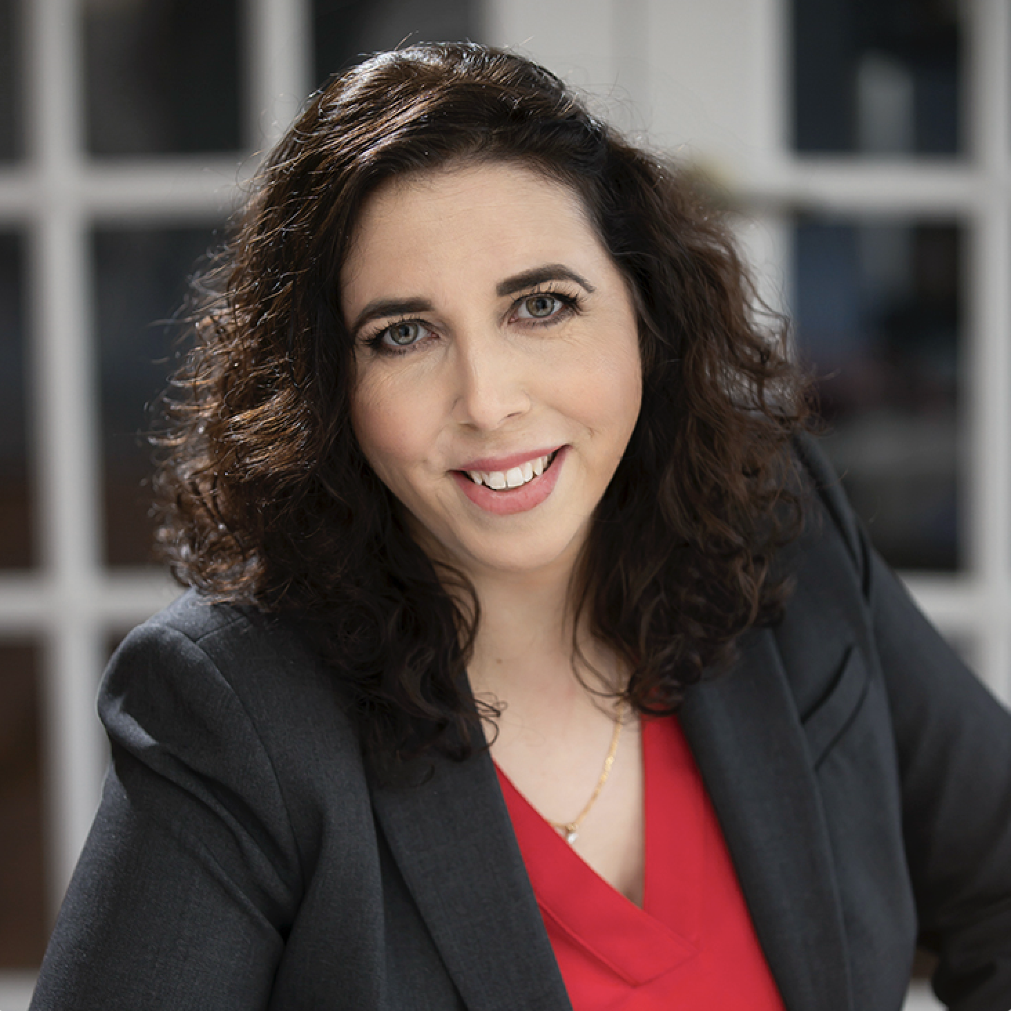 Jennifer Ansbach, PhD, college essay and writing coach, professional headshot.